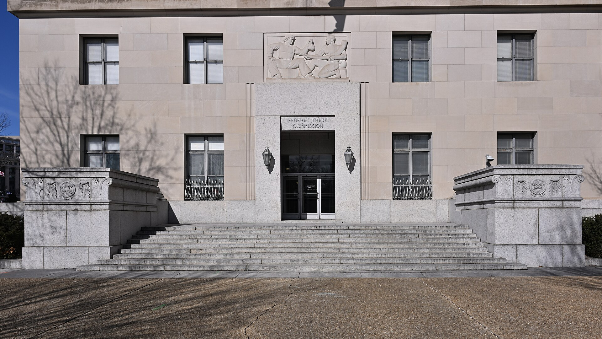 An entrance to the Federal Trade Commission building at 600 Pennsylvania Avenue NW, Washington, D.C., with a bas-relief panel above the door.