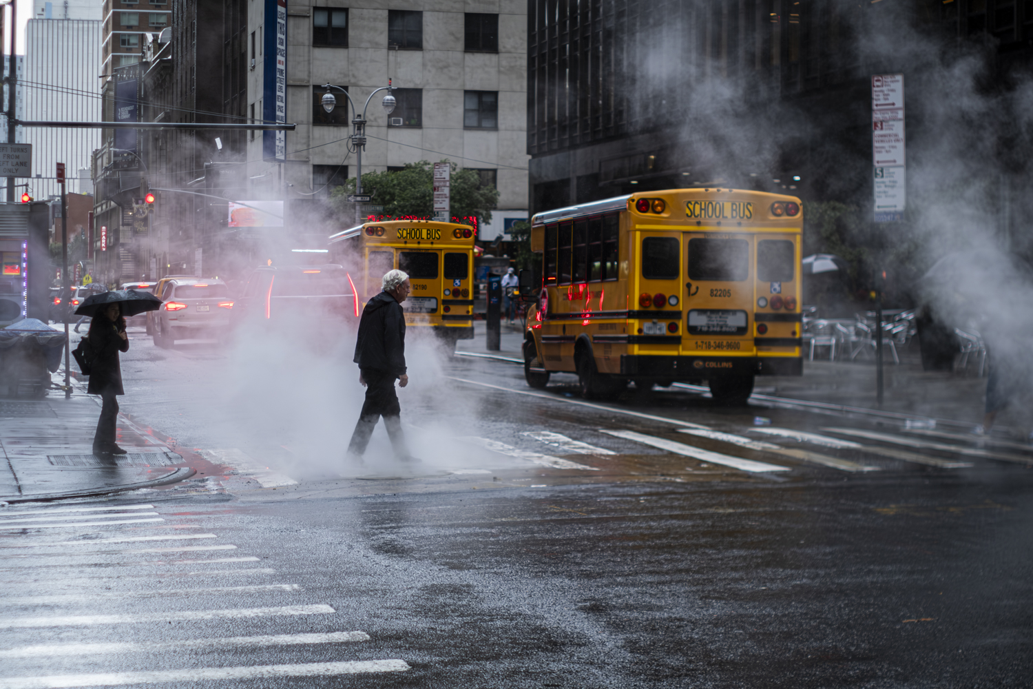 A rainy day in New York City, Manhattan, with flooding in the city.
