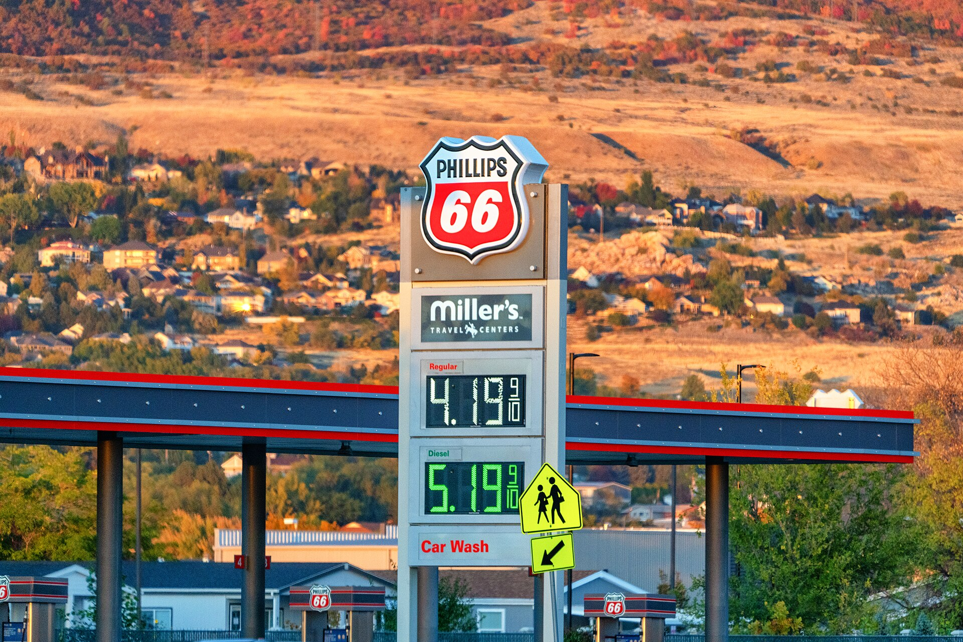A Phillips 66 gas station along 2700 N in Farr West, Utah, in the Salt Lake City area, with fuel prices displayed.